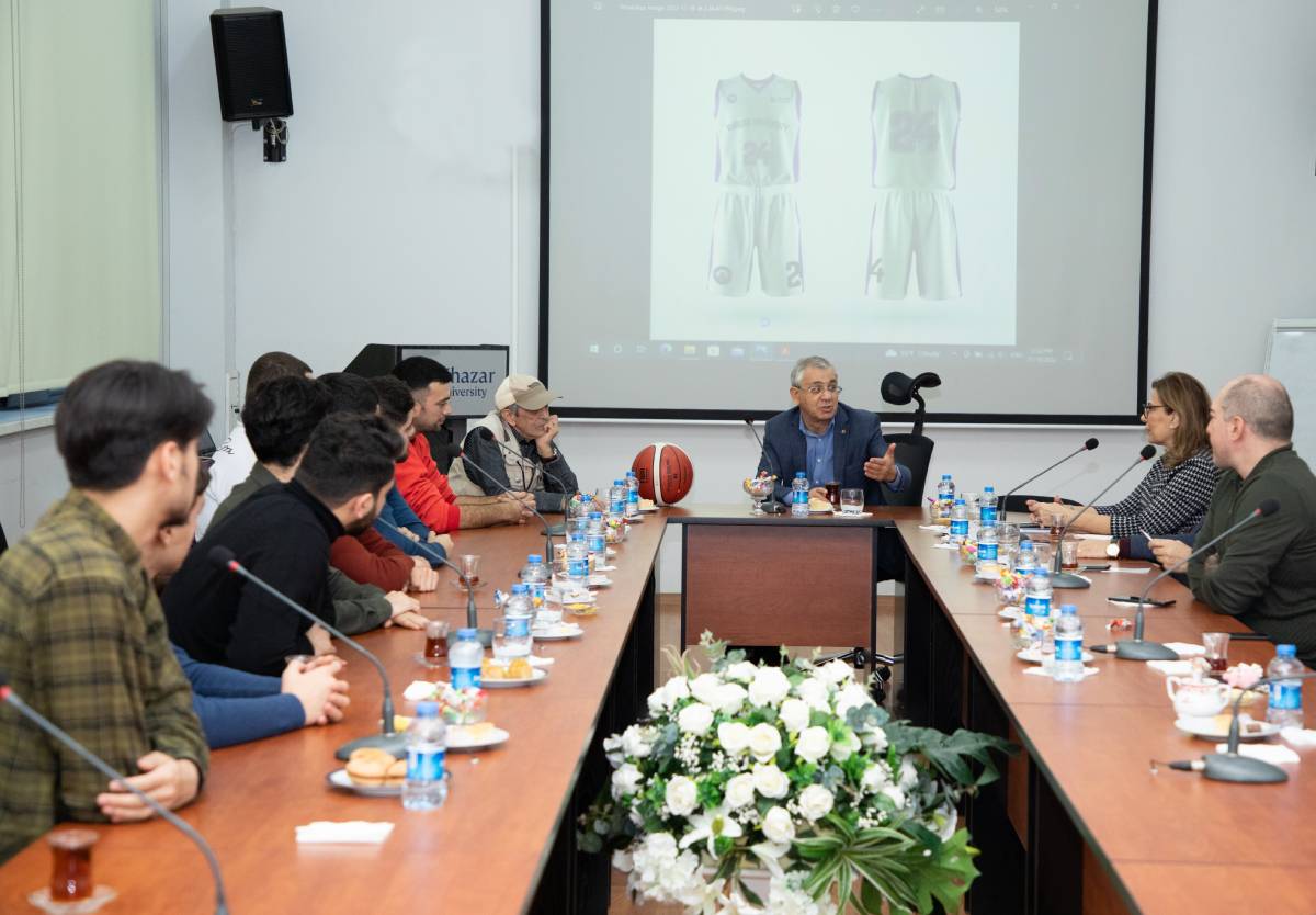 A meeting with the university's basketball team
